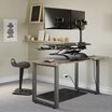 workspace setup with converter desk desk accessories and active seat