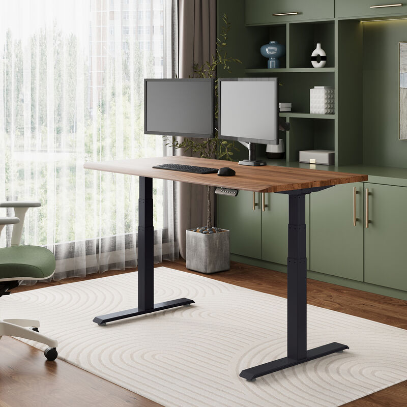 solid wood electric standing desk with a heritage walnut top with black legs in an open home office in raised position image number null
