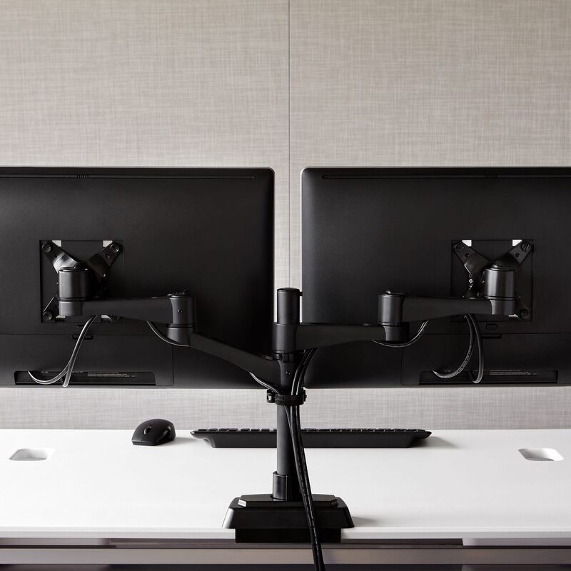 Dual-Monitor Arm 180&deg; Black mounted to desk with two monitors installed image number null