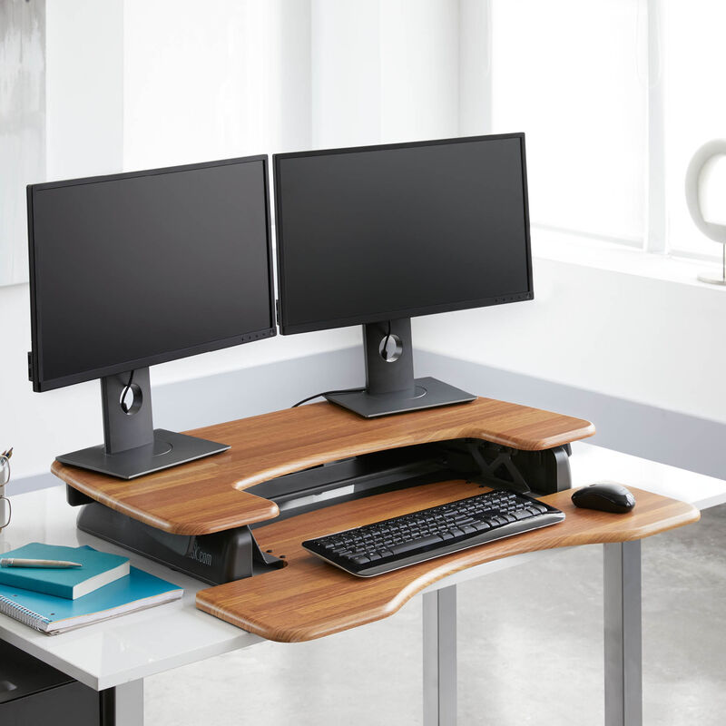 VariDesk Pro Plus 36 Butcher Block sit-stand desk converter lowered in office  image number null