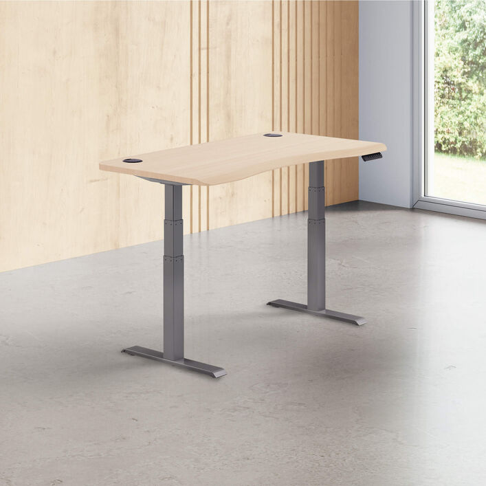 light wood finish standing desk top with slate legs in a open office image number 0