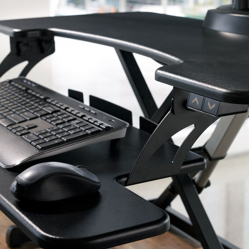 close up view of the keyboard tray of an electric desk converter image number null