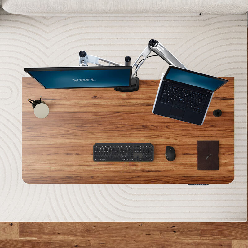 overhead view of a solid wood heritage walnut finish with office tools on top of it image number null