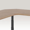curved view of the walnut finish l shape electric standing desk