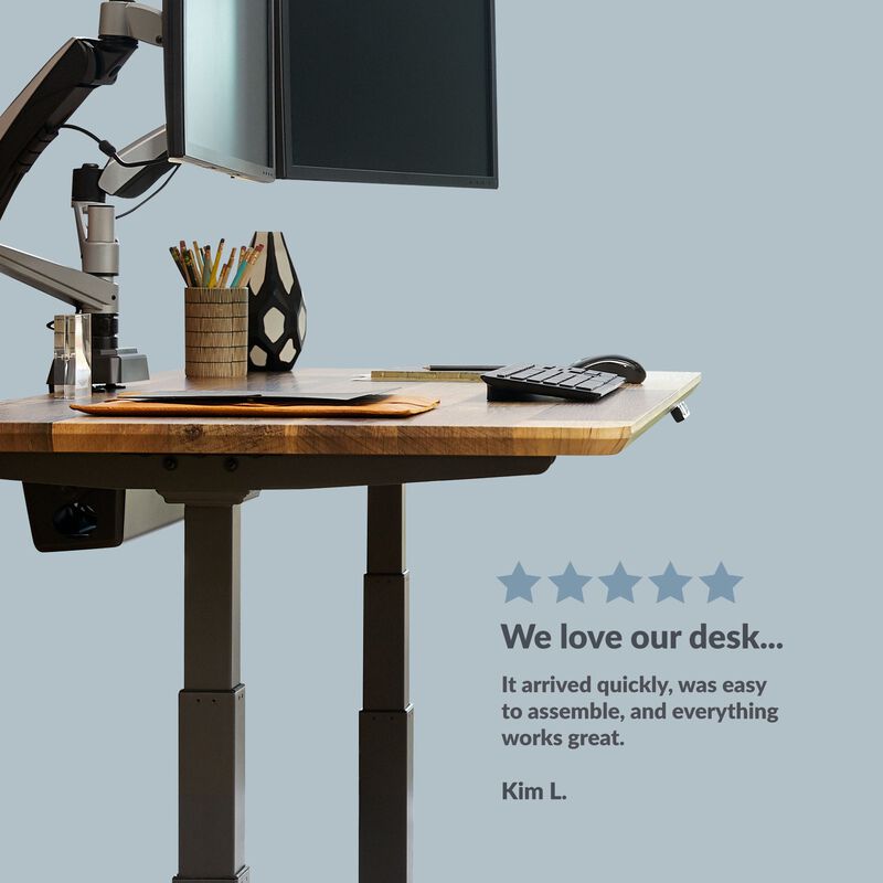 Front view of a electric standing desk with a five star rating with a customer review on the bottom of the image saying "We love our desk... It arrived quickly, was easy to assemble, and everything works great." image number null