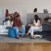 individuals working in an open office setting