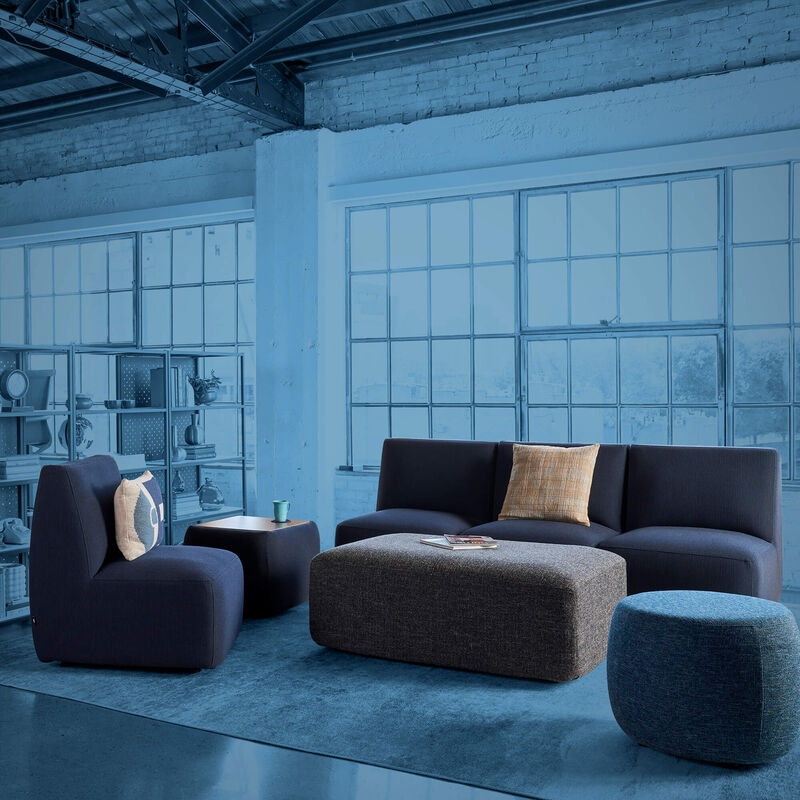 haven soft seating collection in an open office with a blue mask covering up everything but the couches  image number null