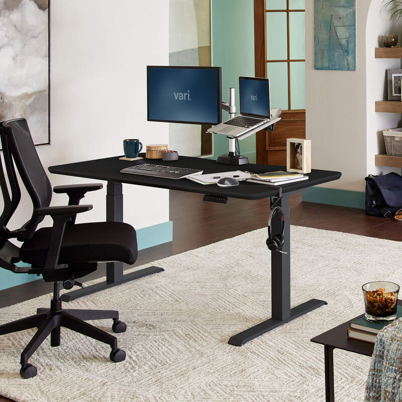 Electric Standing Desk 60x30 Black in lowered position at home image number null