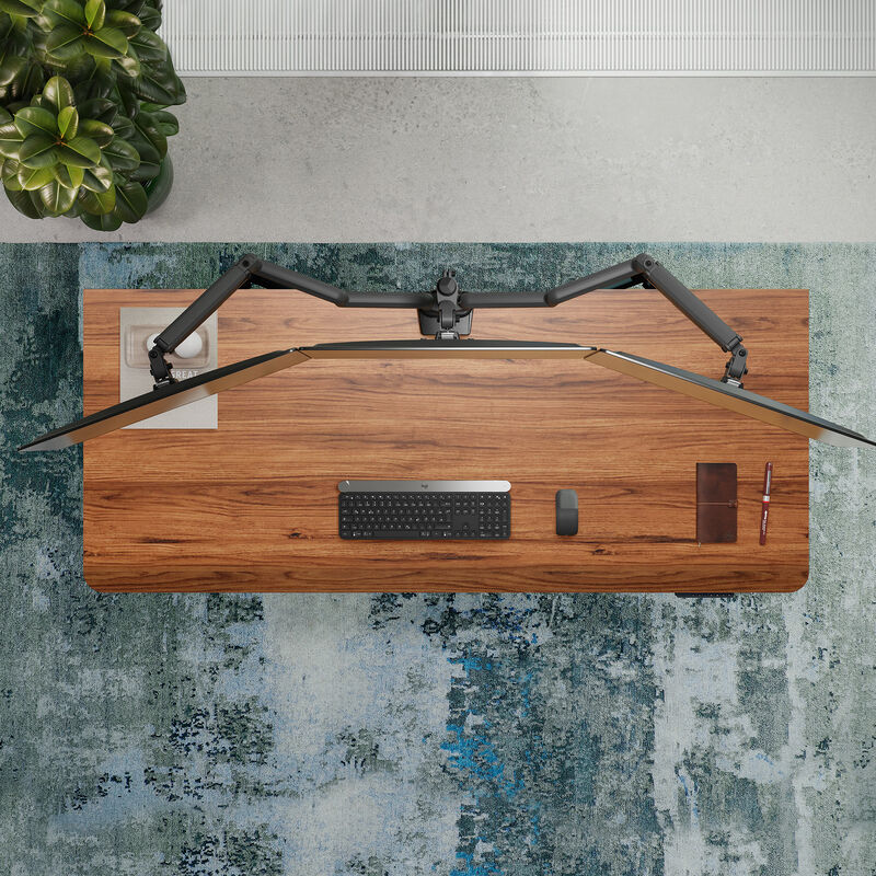 overhead view of the walnut desktop showing a cable management tray mounted beneath the surface. image number null