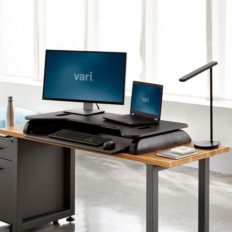 VariDesk&reg; Cube Plus&reg; 40 Black in lowered position at office image number null