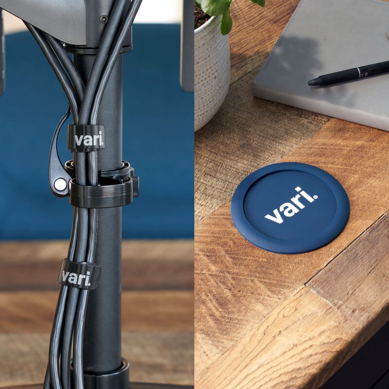 Cable wraps around monitor cables and a coaster on top of a desk image number null