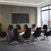 executive conference table in walnut finish setup in a workspace