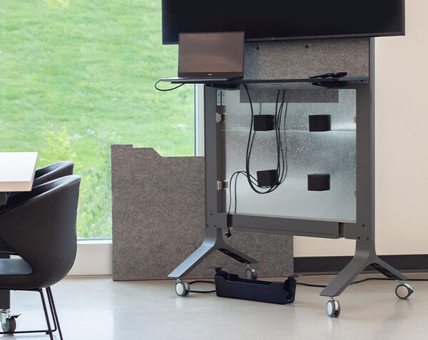 laptop and tv wires shown organized against the mobile media station