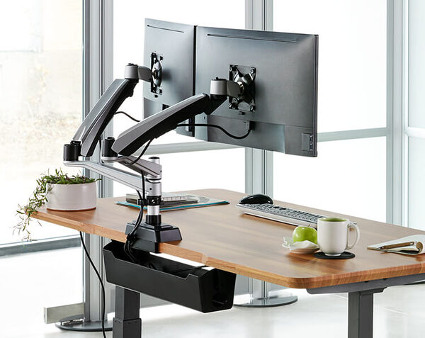 vari cable management tray attached to electric standing desk with monitor arms 