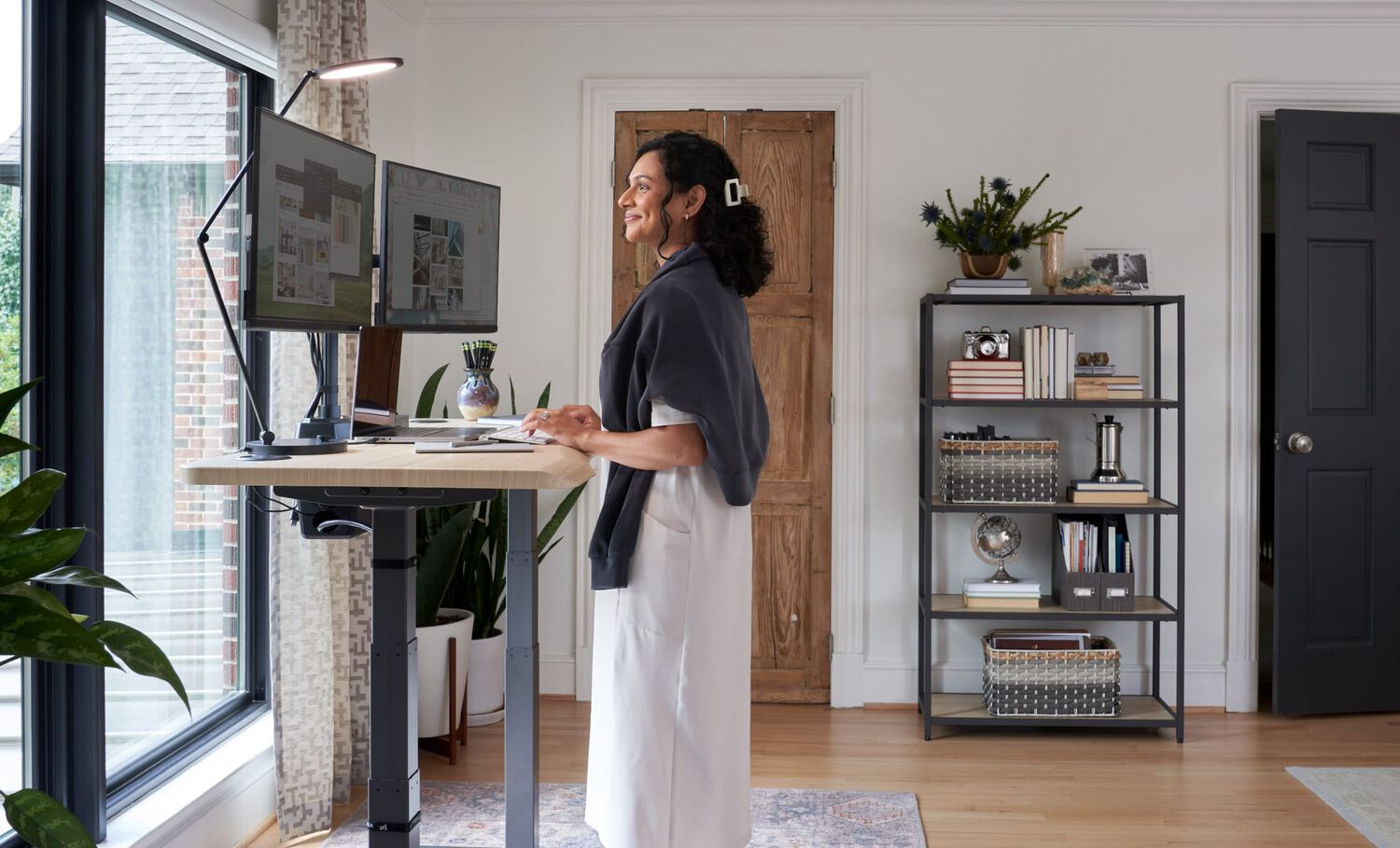 vari electric standing desk in use