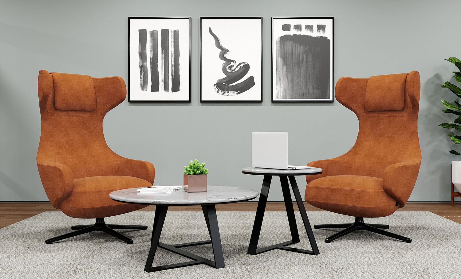 high back lounge chairs around small and large nesting table in office setting