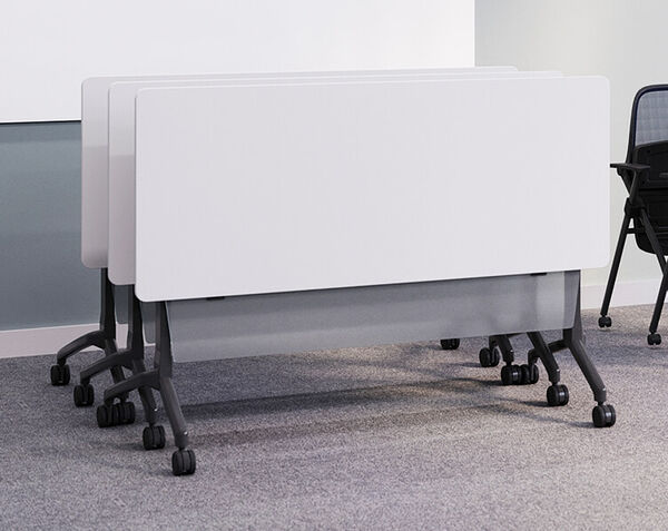 3 flip top training tables with top flipped and nested in office 