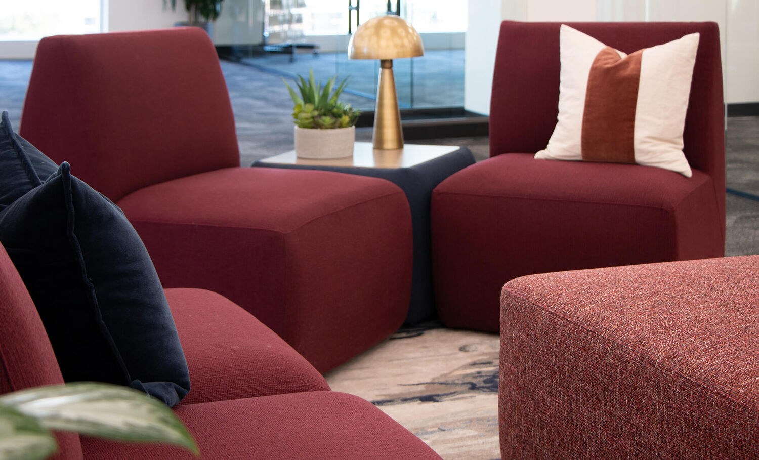 close up view of the haven armless chairs setup in a lounge area of an office