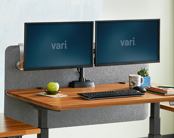 Vari felt panel attached to electric standing desk