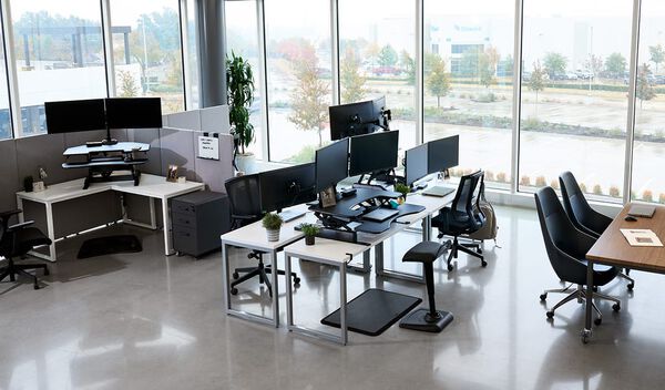 overhead view of a office with individual workspaces 