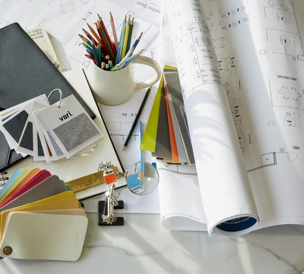various swatches, blueprints and pencils