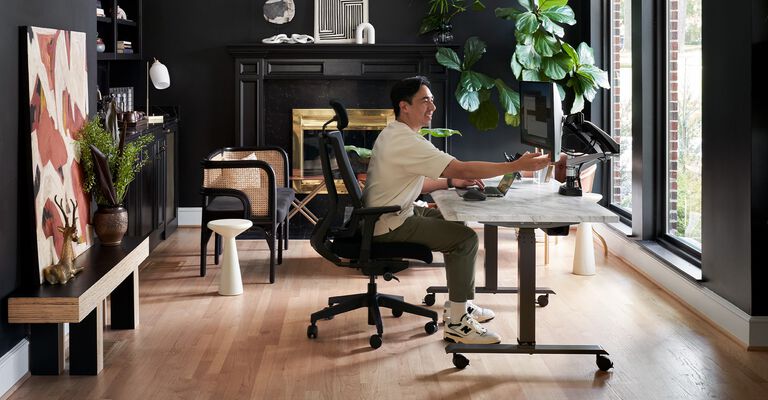 Side views of variety of standing desk solutions