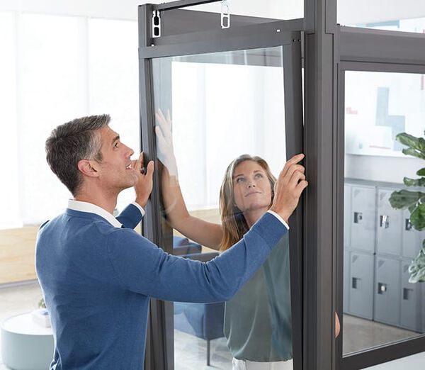 Two professionals installing Vari QuickFlex walls