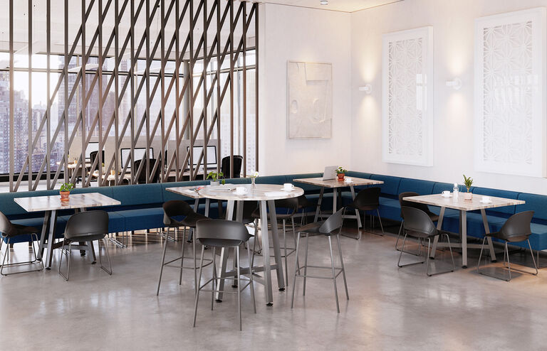 casual break room area with tables and chairs