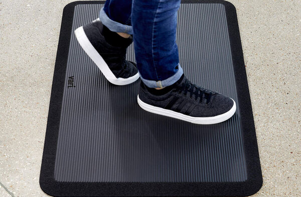 professional standing on vari activemat