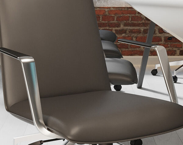 closeup of polished aluminum base, seat cushion and faux leather padded arm rests