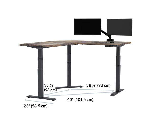 L-shaped desk frame diagram showing foot length twenty-three inches, leg spacing of thirty-eight and one-half inches on two sides, and a diagonal leg spacing of forty inches, with a dual monitor arm on top.
