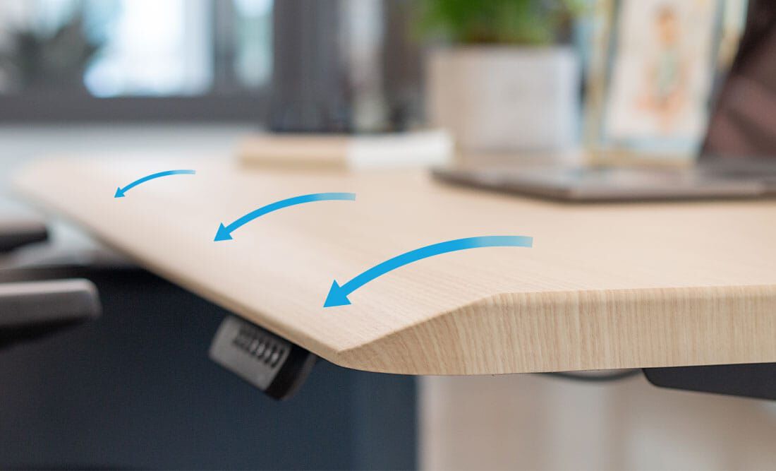 electric standing desk comfort edge slope noting rest points for forearms, elbows and wrists