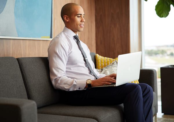 professional using a laptop computer in an office
