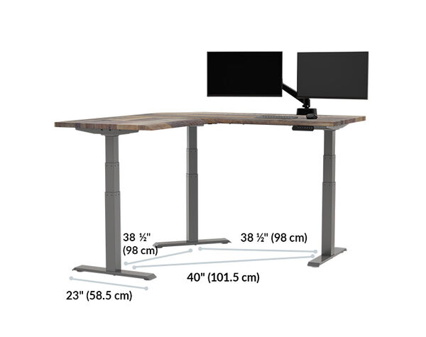 L-shaped desk frame diagram showing foot length twenty-three inches, leg spacing of thirty-eight and one-half inches on two sides, and a diagonal leg spacing of forty inches, with a dual monitor arm on top.
