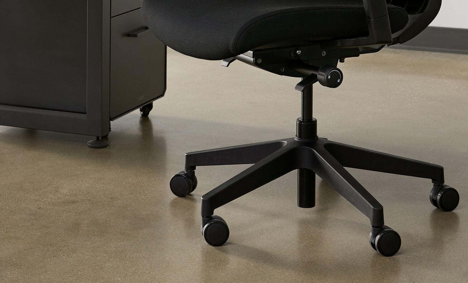 Close up of Vari task chair wheels showing swivel ability