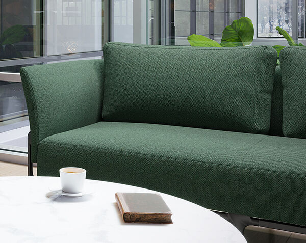 contemporary three seat sofa in a lounge setting