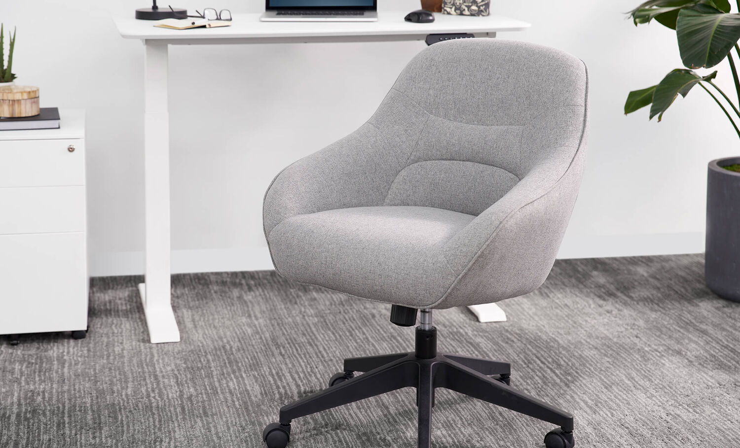 sterling grey upholstered desk chair in office setting