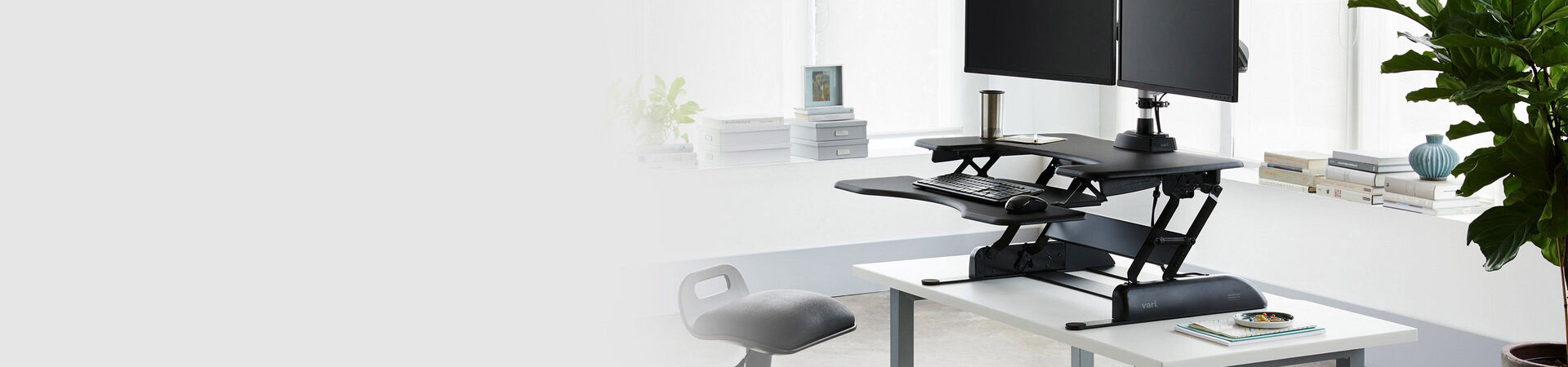 varidesk converter in office on white desk