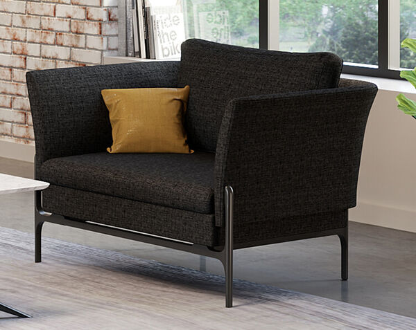 contemporary accent chair in front of window in office