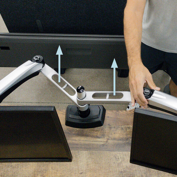 adjusting arms to level monitors