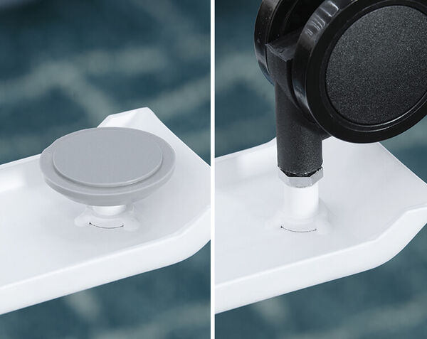 close up view of caster inserted to table leg
