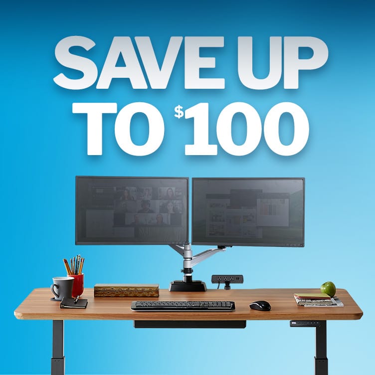 electric standing desk with two monitors over a blue background denotes save up to one hundred dollars