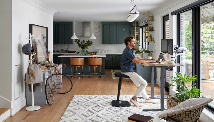 professionals sitting in her home office working