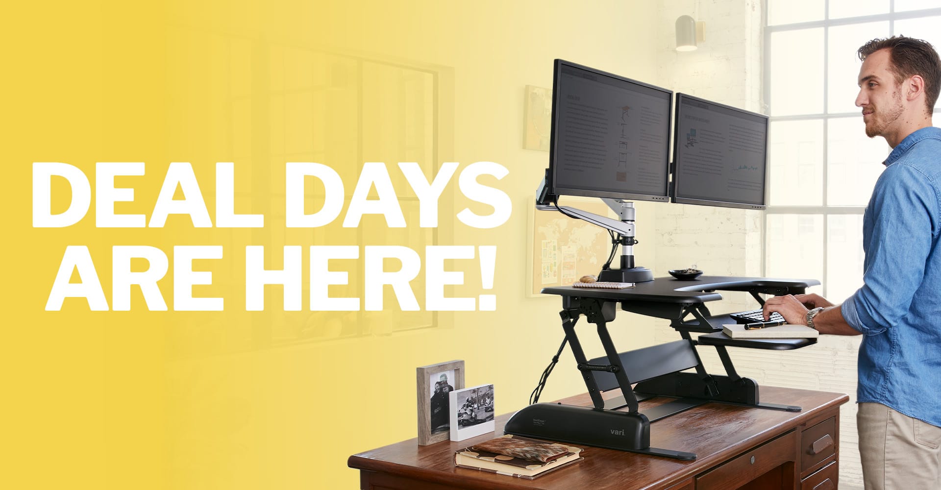 deal days are here with a man standing in an office working at a converter