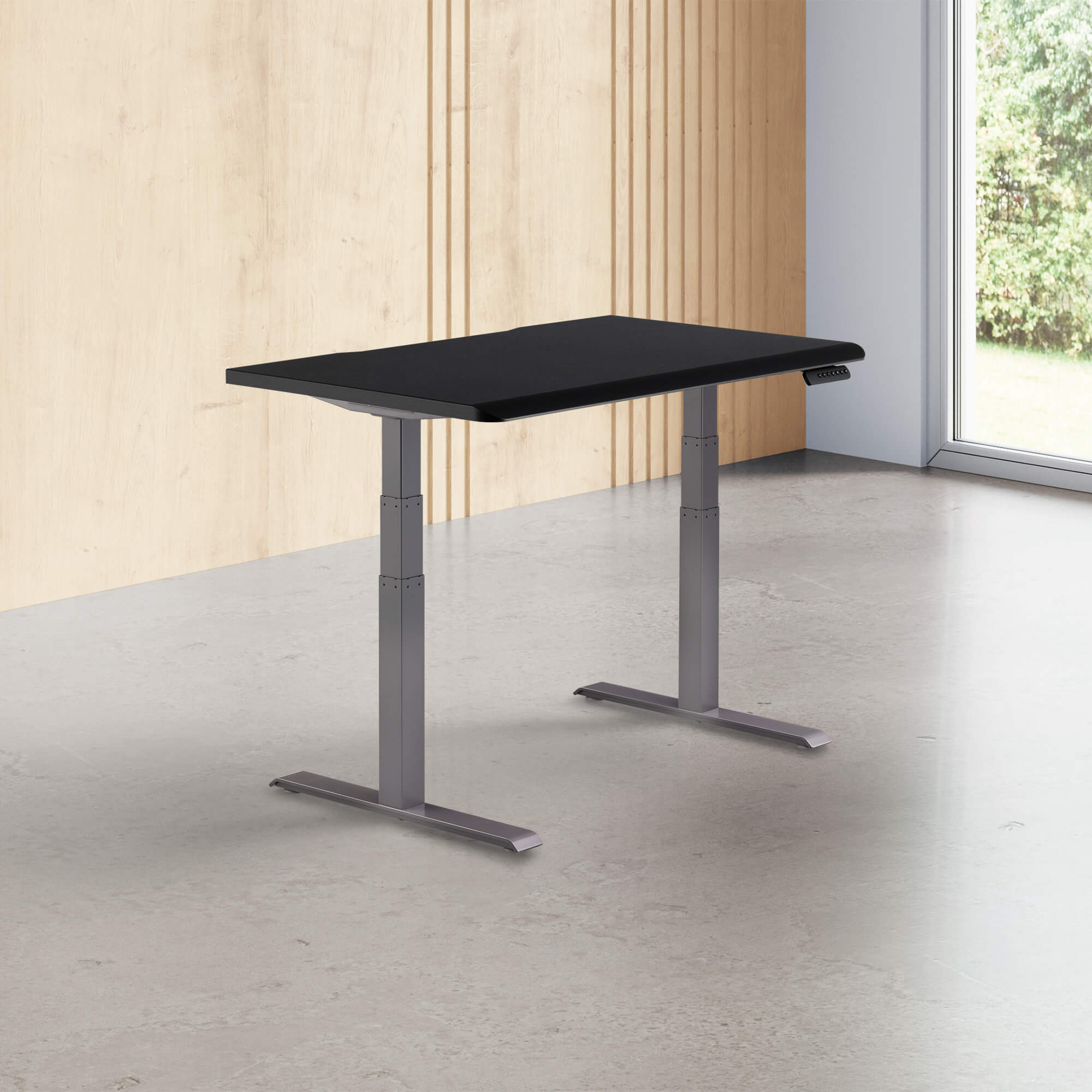 black finish standing desk top with slate legs in a open office image number null
