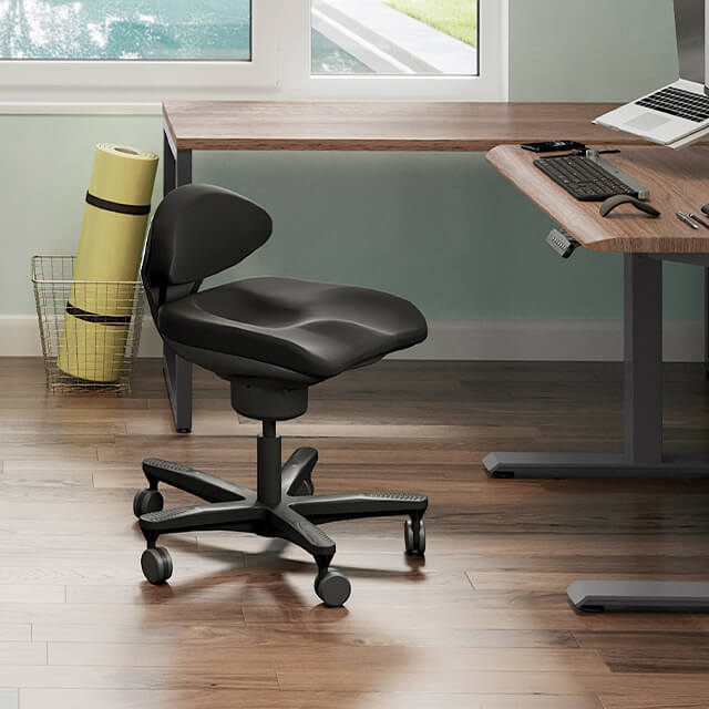 core chair in front of a workstation in a home office
